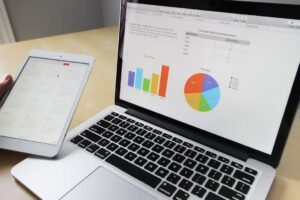 laptop showing graphs